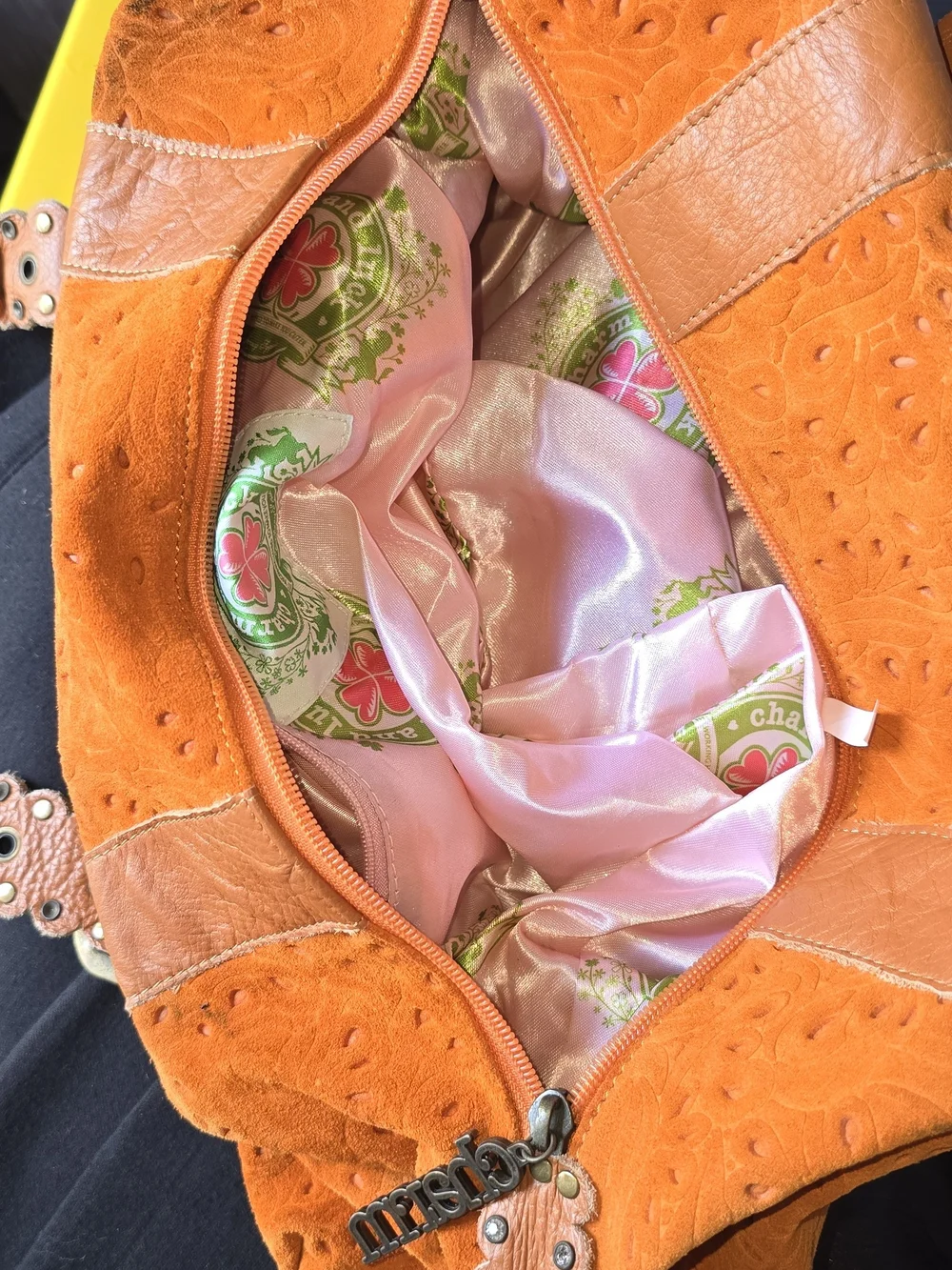 Charm And Luck Bright Orange Floral-Embossed Satchel with Studded Leather Straps